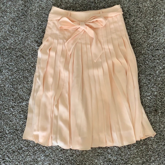 DownEast Dresses & Skirts - peachy cream pleated knee length skirt with tie